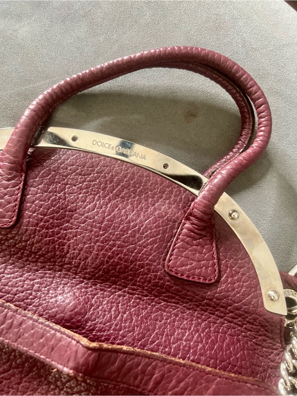 Dolce and Gabbana plum pebbled leather shoulder bag with silver hard ware. - Picture 10 of 14
